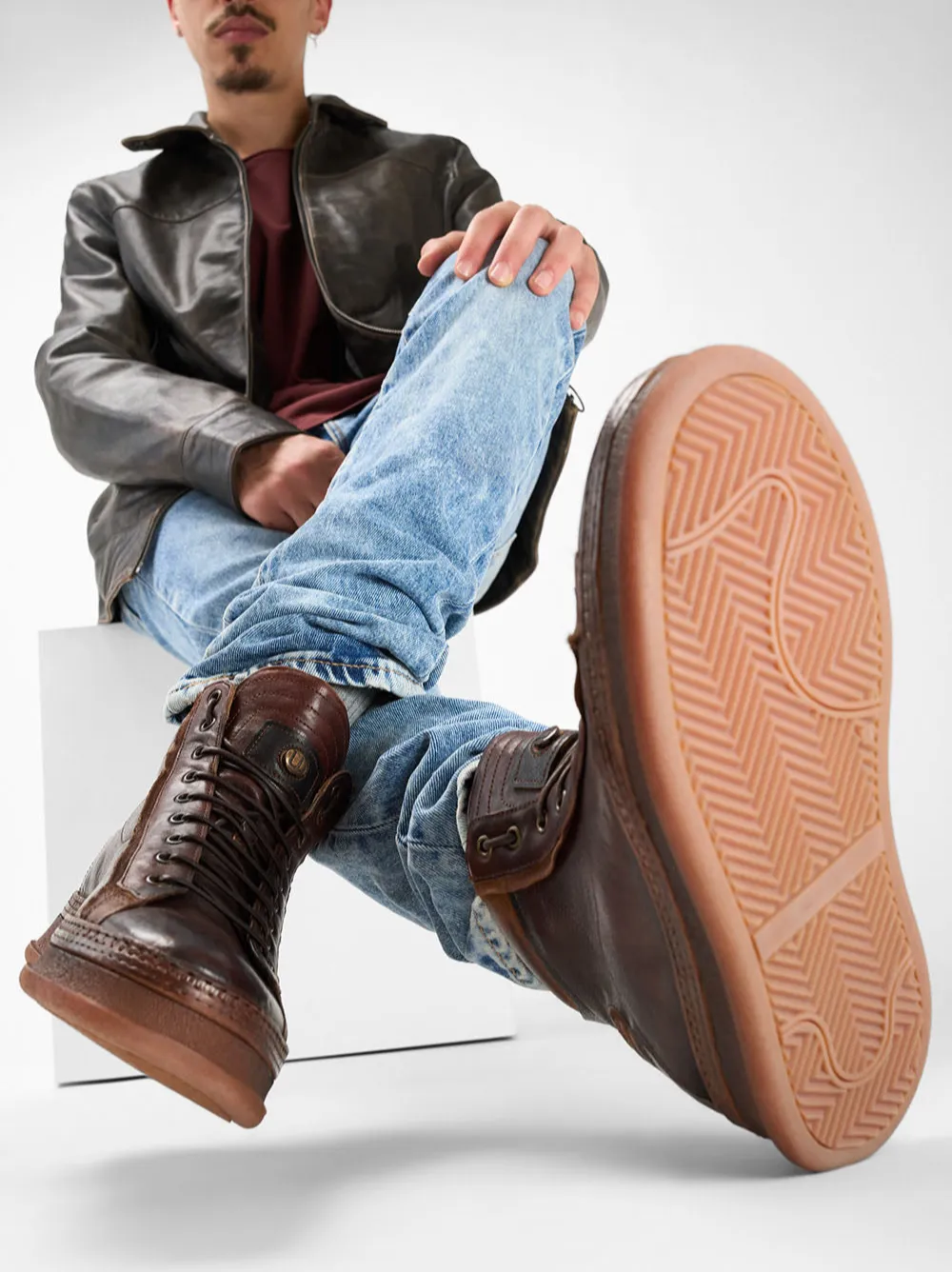 COLE cognac welted distressed high sneakers.